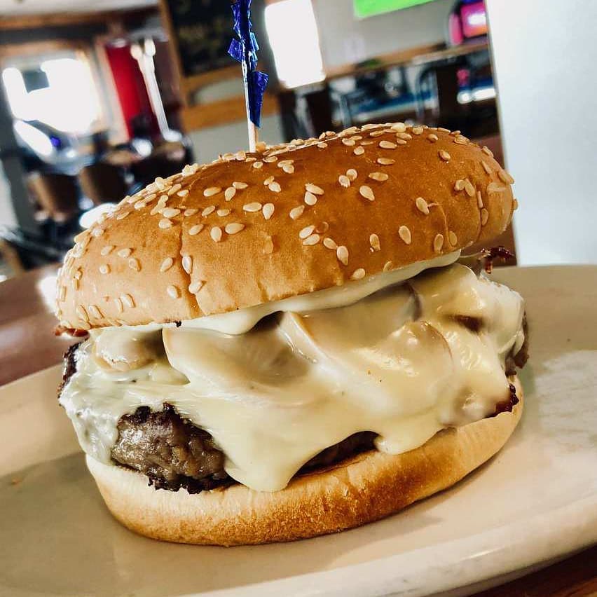 Mouthwatering mushroom, melty cheese and bacon burger